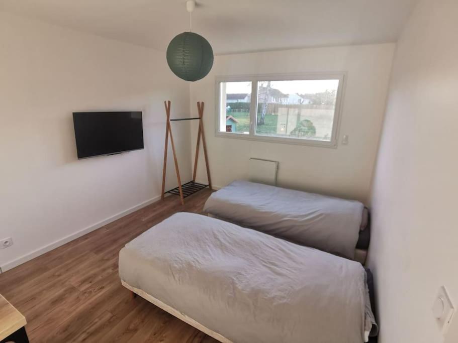 Maison Neuve Au Calme A 2 Pas Du Mans Et Des 24h. Holiday home Ruaudin
